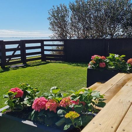 Red Rock Cottage, Beachfront Luxury Clarks Beach Eksteriør billede